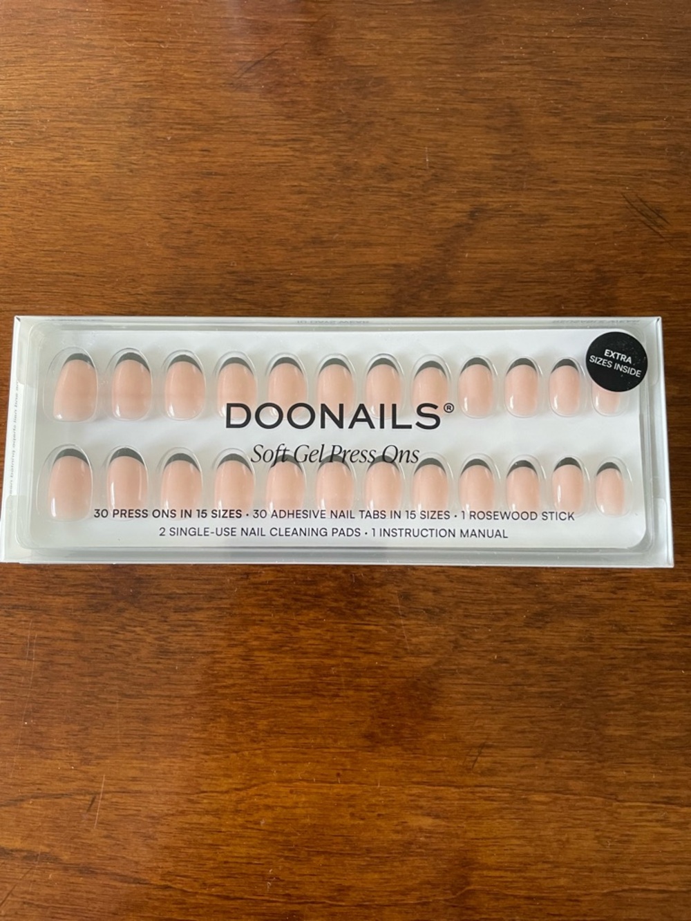 Doonails color is Black French Round box is unopened.